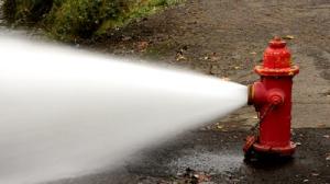 stock-footage-fire-hydrant-flowing-water-out-of-the-steamer-port.jpg